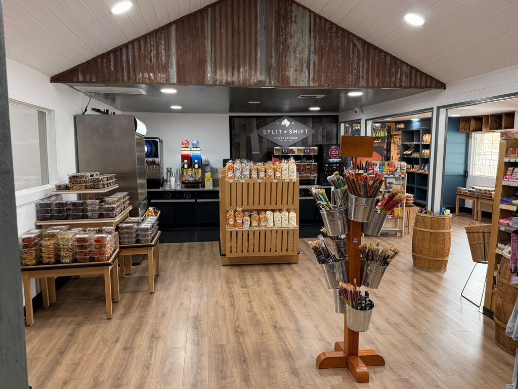Inside the market, shelves stocked with local goods and road-trip supplies