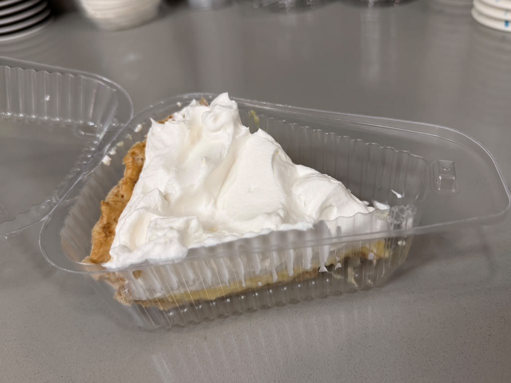 A thick slice of homemade coconut cream pie